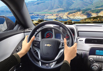 Chevrolet Camaro mit digitalem Gasring Darios und Bremse als Fahrhilfen für Fahrer mit Handicap